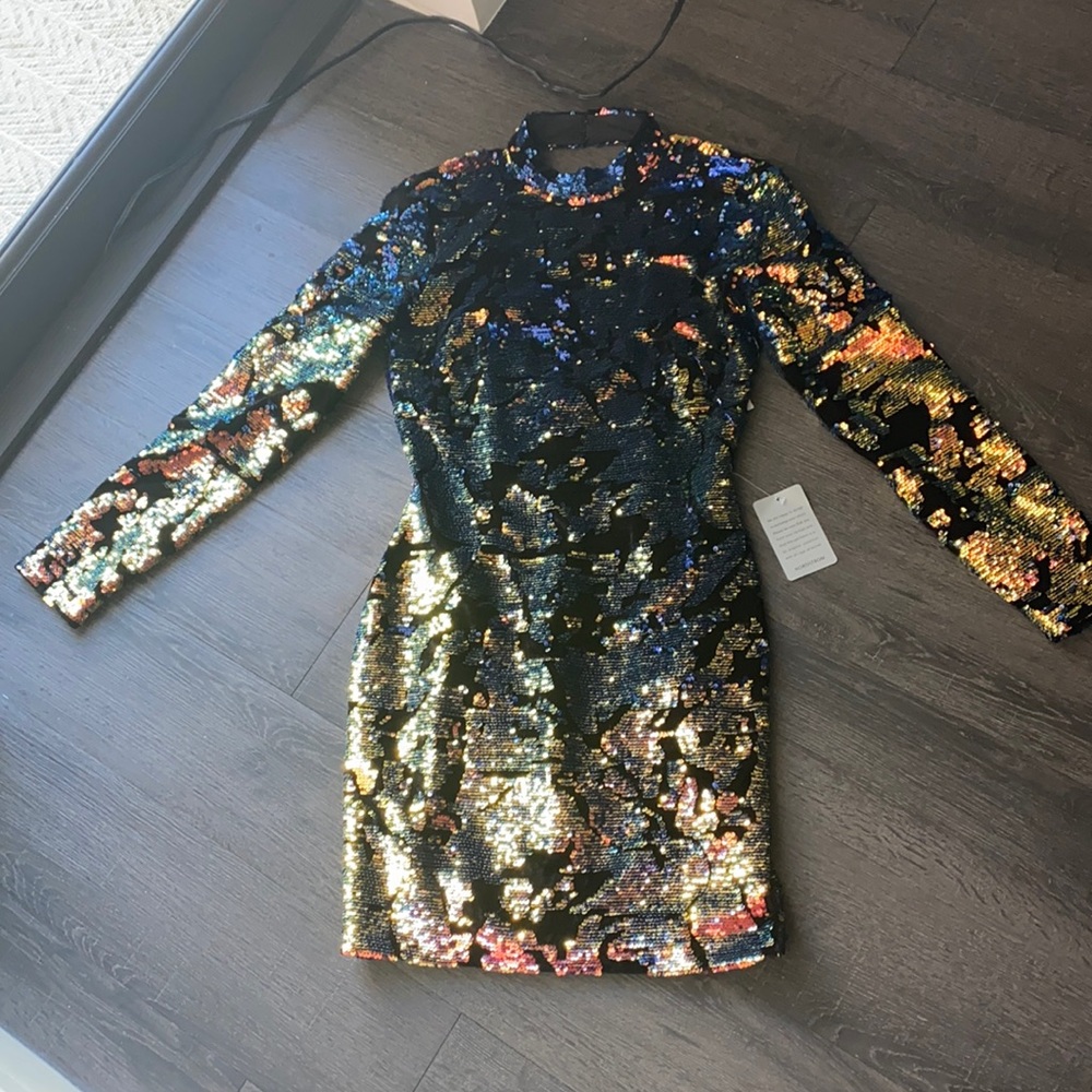 New with tags party dress.   This dress is stunning and never been worn.